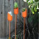 Design-Public-Orange-Stake-Modern-Outdoor-Planters-via-Room-Fu-Knockout-Interiors