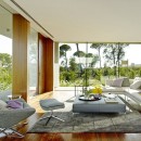 Grey furniture in open plan living room of modern residential home in Sifera, Spain
